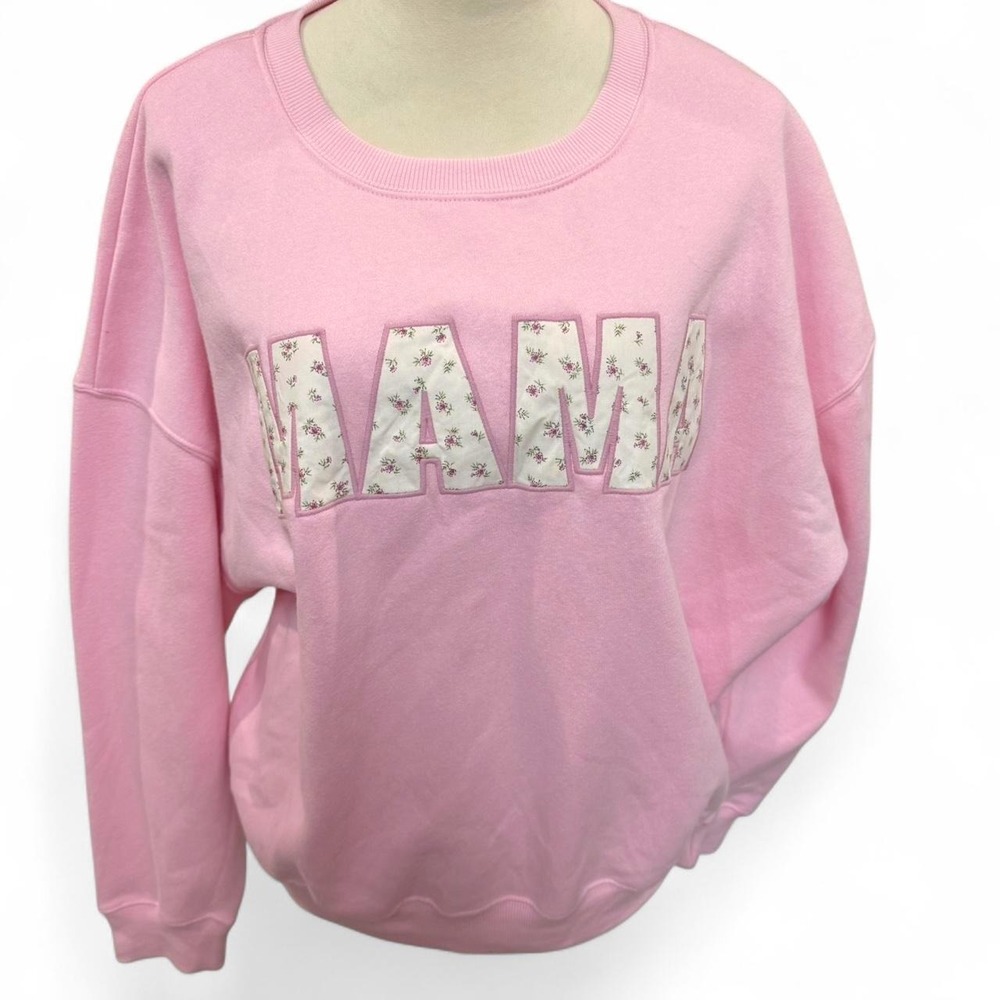 Pink floral print sweatshirt with "MAMA" design floral